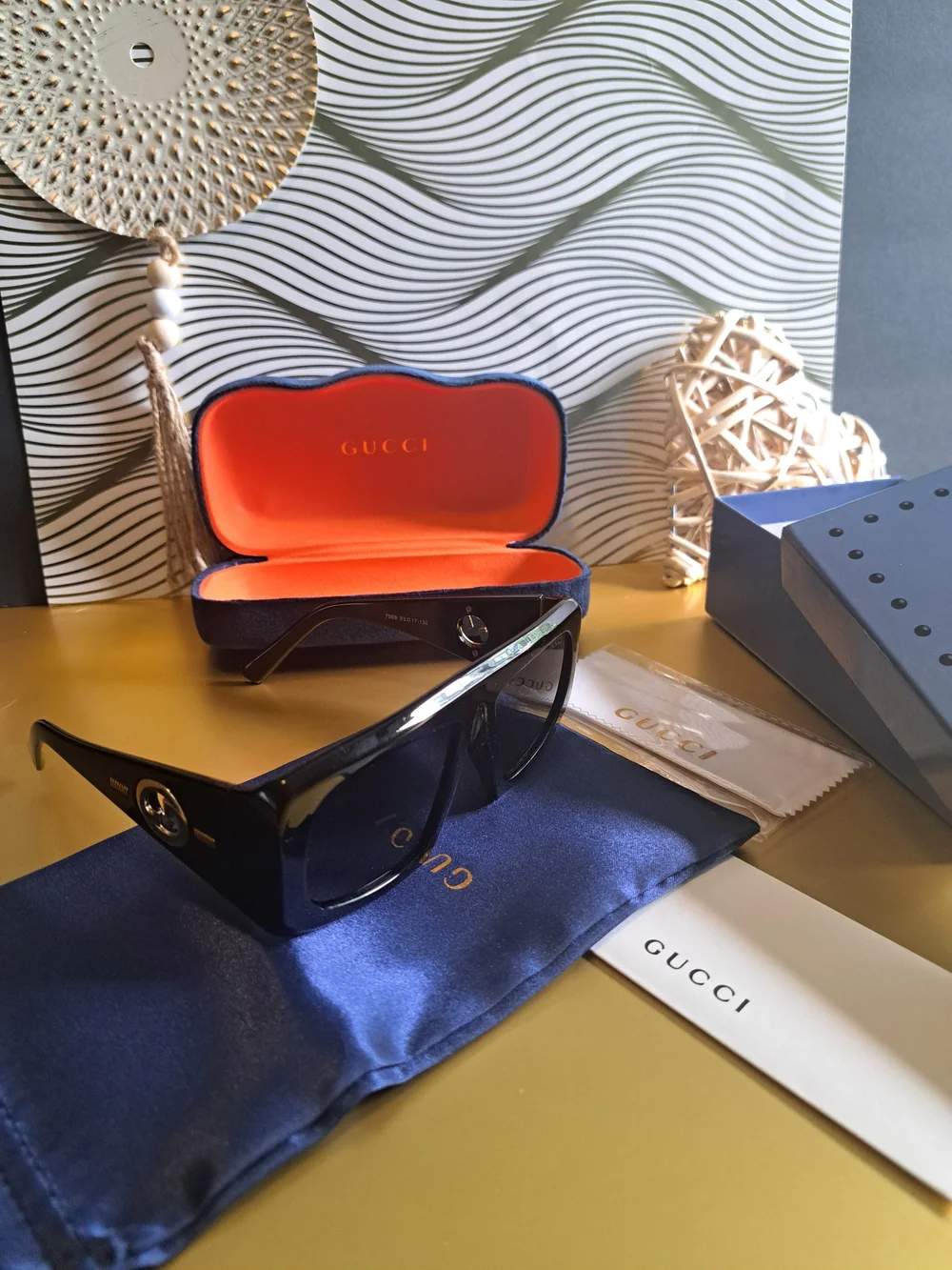 Gucci Black Gloss Square Logo Sunglasses with Gold Accents